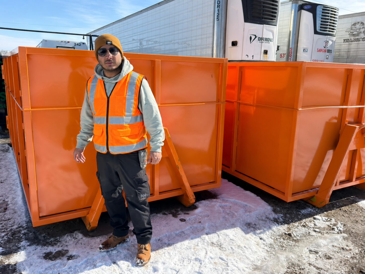 Sam’s Services orange 12-yard bin
